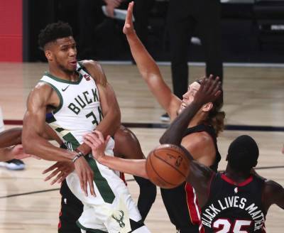 Bucks clinch top see in East with 130-116 win over Heat - clickorlando.com - state Florida - county Lake - county Bucks - county Buena Vista - Milwaukee, county Bucks