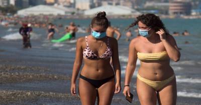 UK weather: How to stay cool in coronavirus face mask as stifling heatwave hits - mirror.co.uk - Britain