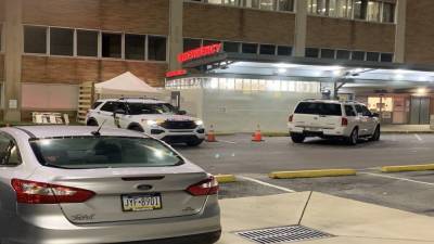 Police: Woman shot while sitting in car with her children - fox29.com