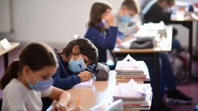 Texts books and face masks as Europe's children return to school - rte.ie - Spain - France