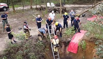 Florida fire crews rescue dog stuck in a sinkhole - clickorlando.com - state Florida - state Alaska - county Alachua