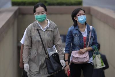 The Latest: India reports lowest coronavirus jump in a week - clickorlando.com - China - city Beijing - Usa - India