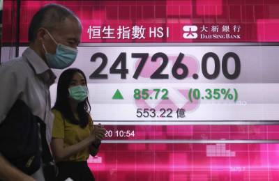 Asian markets mixed after Wall Street rises on dealmaking - clickorlando.com - China - city Tokyo - city Seoul - city Shanghai - city Hong Kong