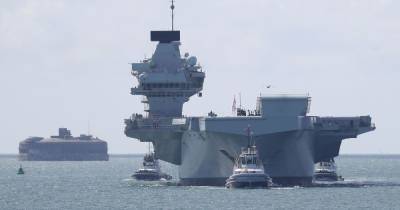queen Elizabeth - Royal Navy - Around 100 sailors aboard Royal Navy aircraft carrier self-isolating after crew test positive for coronavirus - dailyrecord.co.uk - Usa - Britain - Scotland - city Portsmouth