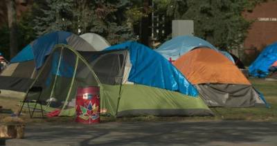Alberta Health Services - Advocates say more plans needed for homeless camps as Edmonton sees 1st COVID-19 outbreak at shelter - globalnews.ca - county Camp