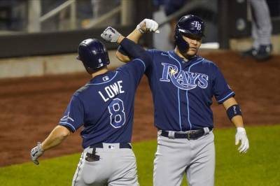 Randy Arozarena - Rays beat Mets 8-5, clinch 1st AL East title in 10 years - clickorlando.com - New York - city New York - county Bay - city Tampa, county Bay
