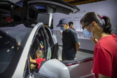 China auto show forging ahead under anti-virus controls - clickorlando.com - China - city Beijing - city Tianjin - Sweden