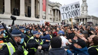 Police clash with thousands as demonstrators protest against COVID-19 restrictions in UK - fox29.com - Britain