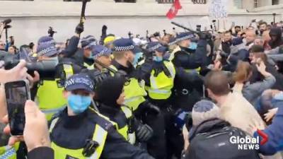 Coronavirus: Anti-lockdown protesters clash with police in London’s Trafalgar Square - globalnews.ca - city London