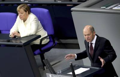 Olaf Scholz - German minister says debt won't reach financial crisis level - clickorlando.com - Germany - city Berlin