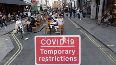 Boris Johnson - Social gatherings of more than six to be banned in England as Covid-19 cases rise - rte.ie - Britain