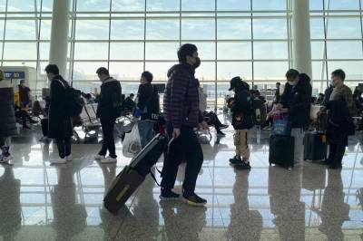 WHO team arrives in Wuhan to search for pandemic origins - clickorlando.com - China - city Wuhan - city Beijing