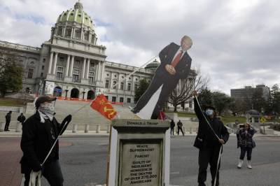 The Latest: Pro-Trump demonstrations begin at statehouses - clickorlando.com - state Pennsylvania - city Harrisburg, state Pennsylvania - state South Carolina - Columbia, state South Carolina