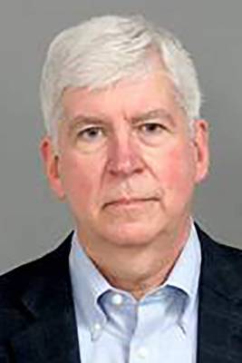 Rick Snyder - Attorneys: Ex-governor charged in wrong county over Flint - clickorlando.com - state Michigan - county Genesee - city Lansing, state Michigan