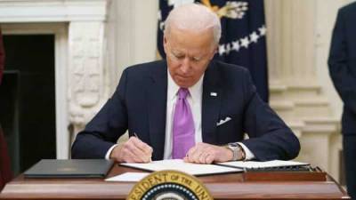 Biden moves to jump-start Covid fight with slew of orders - livemint.com - Washington
