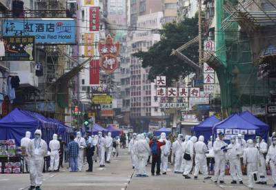Thousands of Hong Kongers locked down to contain coronavirus - clickorlando.com - Hong Kong - city Hong Kong