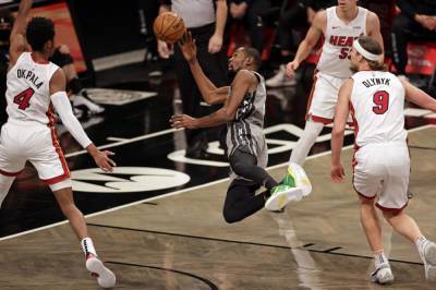 Kevin Durant - Harden, Durant help Nets break away late, beat Heat 98-85 - clickorlando.com - New York