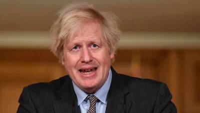 Johnson takes 'full responsibility on what govt has done' as UK COVID-19 deaths top 1-lakh mark - livemint.com - Britain
