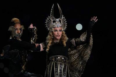Did Madonna have the best Super Bowl performance of all time? Vote in our bracket - clickorlando.com