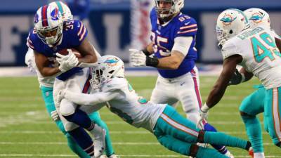 Josh Allen - Brian Flores - Frank Reich - Bills eliminate Dolphins with 56-26 rout; set to host Colts - clickorlando.com - state New York - county Buffalo - county Park - city Houston - city Indianapolis - county Allen
