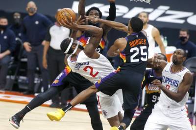 Chris Paul - Devin Booker - Deandre Ayton - Paul George - George scores 39 points, Clippers hold off Suns 112-107 - clickorlando.com - Los Angeles - city Los Angeles