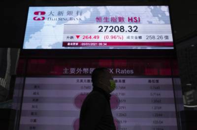 Asian stocks mixed after Wall St retreat as virus cases rise - clickorlando.com - South Korea - Japan - Hong Kong - Australia - city Tokyo - city Shanghai