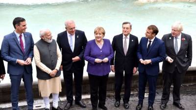 G20: Leaders commit to reaching climate neutrality, end coal financing - fox29.com - China - India - Italy - Britain - city Rome - Scotland