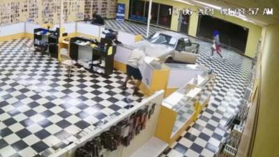 Bold burglars caught on video crashing car into storefront to steal merchandise - fox29.com - state Oklahoma - county Tulsa