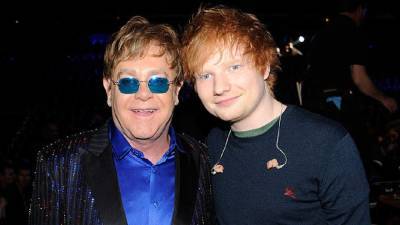 Elton John - Ed Sheeran - Zane Lowe - Michael Gudinski - Ed Sheeran Says Elton John Has Called Him 'Every Day' Amid COVID-19 Battle - etonline.com