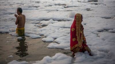 Hindus take holy dip in sacred Yamuna River despite toxic foam - fox29.com - city New Delhi - India