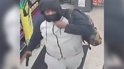 Gun-toting robbery suspect takes cash drawer from Crescentville gas station market, police say - fox29.com