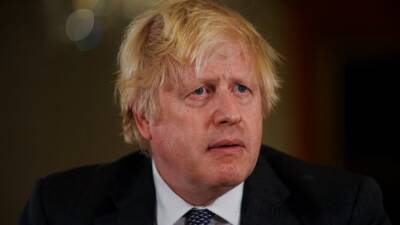 Boris Johnson - Dozens of Conservative MPs to defy Johnson over Covid passes - rte.ie - Britain