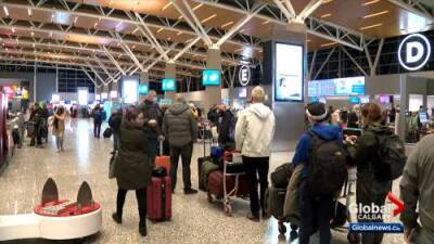 COVID-19: Canadians continue to travel despite new federal advisory - globalnews.ca