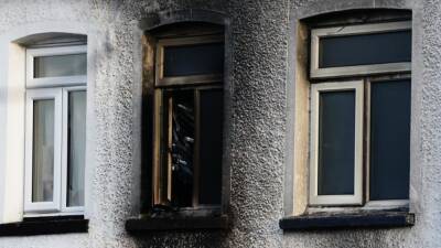 Two sets of twins killed in house fire in London, woman arrested - fox29.com - Britain - city London - county Sutton