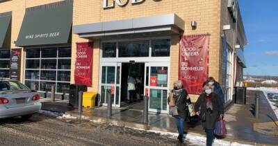 Ontarians line up outside LCBOs in search of free COVID-19 rapid tests - globalnews.ca