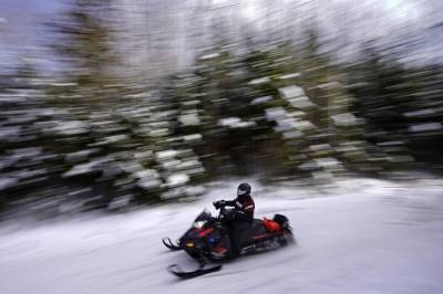 Masks, social distancing and speed: Snowmobiles enjoy boom - clickorlando.com - Usa - Canada - state Montana - state Maine - city Portland, state Maine