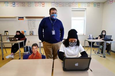 As virus cuts class time, teachers have to leave out lessons - clickorlando.com - Britain