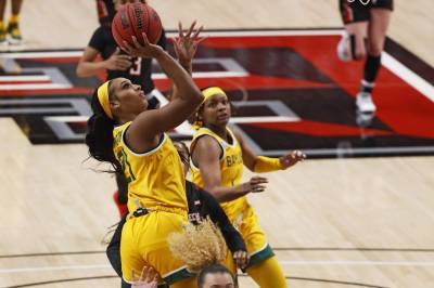 The Latest: Big 12 reschedules 9 women's basketball games - clickorlando.com - state West Virginia - state Texas - state Iowa - state Kansas - state Oklahoma
