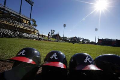 MLB cuts spring training travel, drops college opponents - clickorlando.com - New York - state Florida - state Arizona - county Major