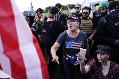 Belle Plaine - Woman charged in Capitol melee says Proud Boys recruited her - clickorlando.com - state Arizona - city Kansas City