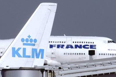 Air France-KLM plunges to huge loss in pandemic-hit year - clickorlando.com - France - Netherlands