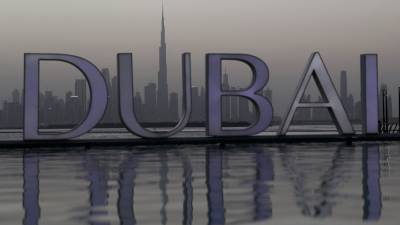 Dubai shuts bars after coronavirus surge - rte.ie - city Dubai