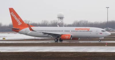 Sunwing taps into federal loan program for $375M amid new travel rules - globalnews.ca