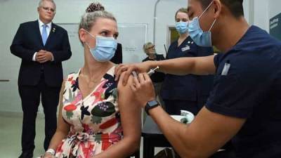 Scott Morrison - Day after anti-vaccine protests, Australia begins Covid-19 inoculation drive - livemint.com - Australia