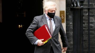 Boris Johnson - Covid-19 restrictions to be eased in England next month - rte.ie - Britain