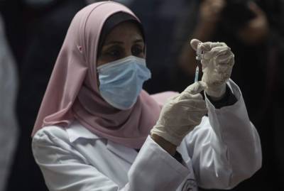 Hamas-ruled Gaza launches coronavirus vaccination drive - clickorlando.com - Russia