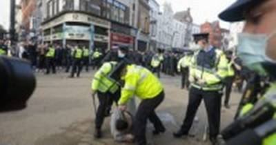 Micheál Martin - Police officers injured and protesters arrested at Dublin Covid-19 anti-lockdown rally - dailyrecord.co.uk - city Dublin