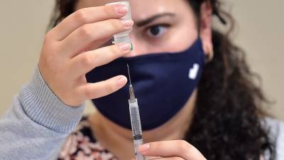 First dose of Pfizer COVID-19 vaccine protects against asymptomatic infection, UK study finds - fox29.com - Britain