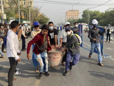 Scores arrested as Myanmar police disperse anti-coup rally - clickorlando.com - Burma - city Yangon