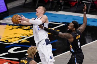 Kevin Durant - Luka Doncic - Kristaps Porzingis - Mavs end Nets' 8-game run as Porzingis returns, Irving sits - clickorlando.com - New York - county Dallas - county Maverick